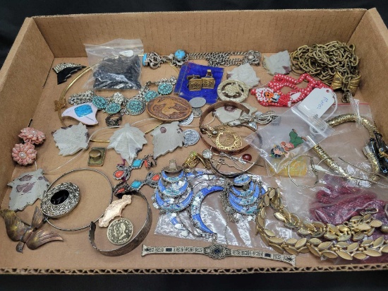 Large lot of assorted costume jewelry, necklaces, pins, earrings
