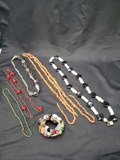 Lot of costume jewelry necklaces and button bracelet