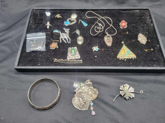 Group of silver tone, turquoise and unmarked silver jewelry
