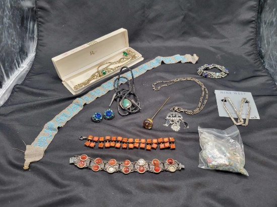 Group of vintage and modern costume jewelry, bracelets, earrings, necklaces and beaded piece