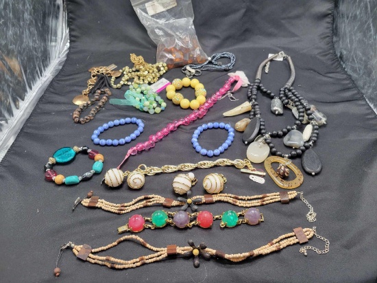 Group of vintage plastic beaded necklaces, bracelets and more