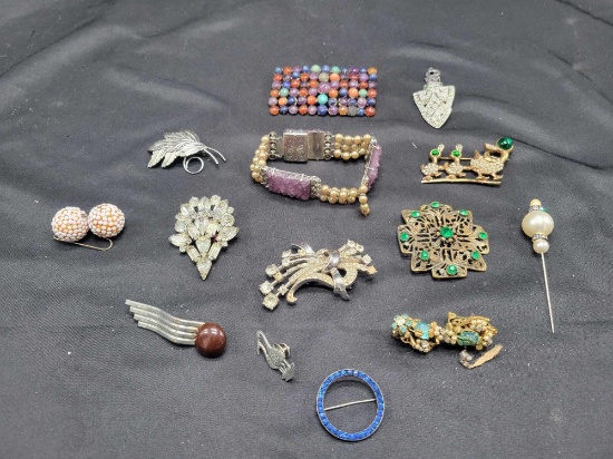 Group of vintage rhinestone and assorted costume jewelry, pins, earrings, brooches