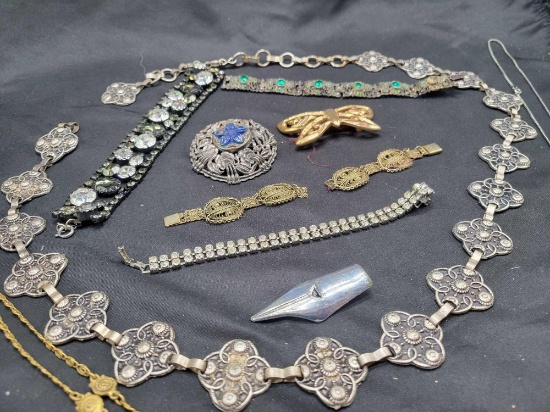 Group of silver tone and rhinestone costume jewelry, necklaces, bracelets and brooches