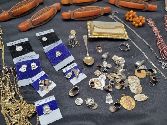 Bakelite drawer pulls, sterling jewelry, earrings and belt buckle
