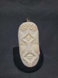Indonesian carved cameo pendant, butterfly mask