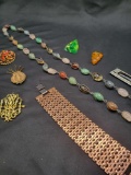 Vintage brooches, one made in Austia, beaded necklace and lucite green ring