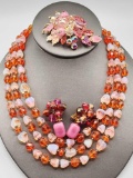 Vintage costume lot: orange glass beads, rhinestone pin & Carnegie earrings