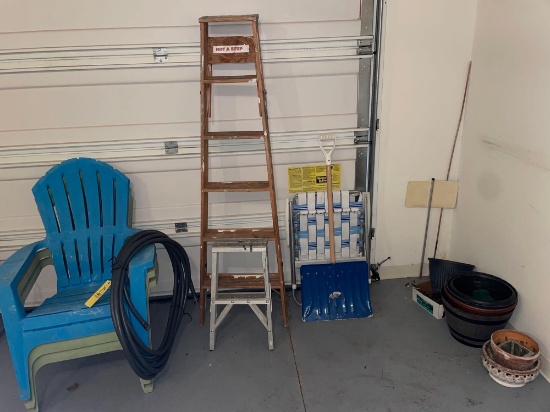 Ladders, plastic patio chairs, lawn chair, garden hose, flower pots and snow shovel