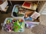 2 boxes and 2 totes loaded with children's toys and books