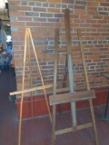 Two folding easels wood art display stands
