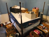Full size poster bed with 2 sets of matresses and boxsprings