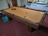 Brunswick Bristol slate pool table with cover, balls, and cues