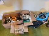 Phones, mugs, desk items, candle holder, book ends