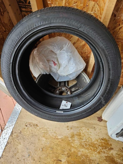 Bridgestone 18in tire with rim