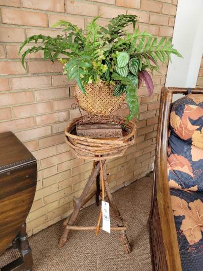 Bent wood stand with artificial plant