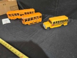 School Bus and Two Train Cars