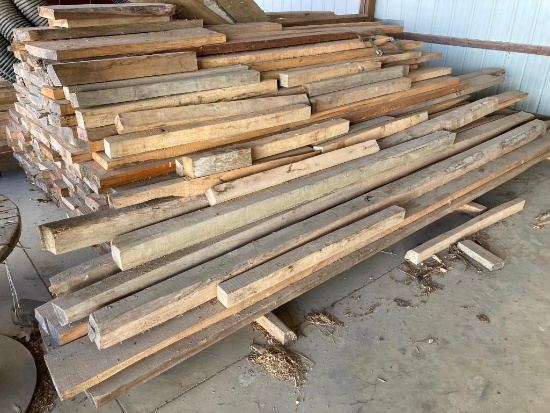 Several board feet of rough cut lumber assorted sizes