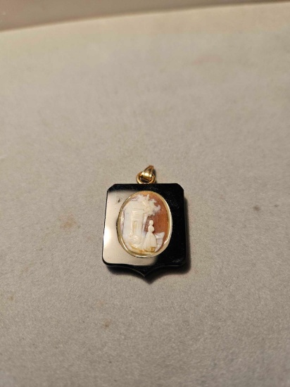 Victorian jet and shell cameo with 14k gold bail