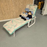 Outdoor lounge chair with dolls
