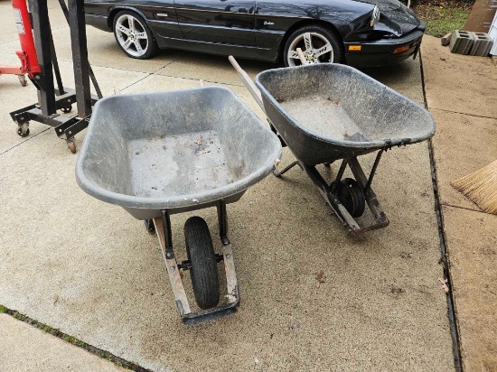 Pair of Wheelbarrows - one has damage