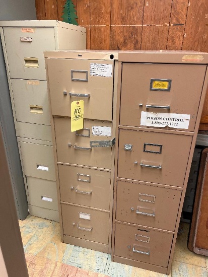 Three Metal file cabinets