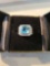 Lady's 14k white gold ring with blue topaz