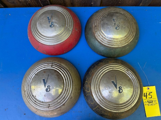 4 Early Ford hubcaps