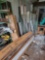 Large lot of shelving, racks, lumber, folding tables and more