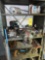 Shelving Unit & Contents - Briggs & Stratton Engine, Car Parts, Metal Pieces, & more