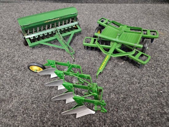 Assortment of Vintage John Deere Implements - Plow, Strap Disk. Green Lid Grain Drill 1/16