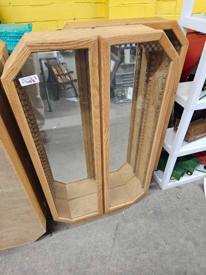 Custom built oak display cabinets with glass shelves
