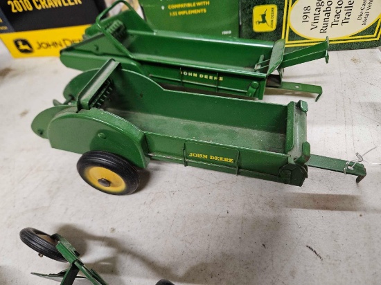 Early JD manure spreaders, 1/16th, bid x 2