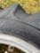 Pair of 9.5-24 tires on rims and pair 4.00-15 tires