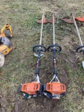 pair of Stihl straight shaft weed whips