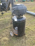 upright air compressor runs