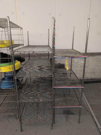 Pair of chrome metal shelves