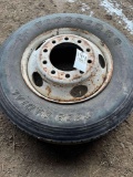 Firestone T559 Radial 10R-22.5 tire on 10 bolt rim