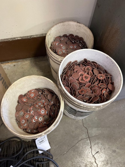 Three Buckets Full of Polishing Wheels