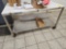 SS table on casters with cutting top, 5ft