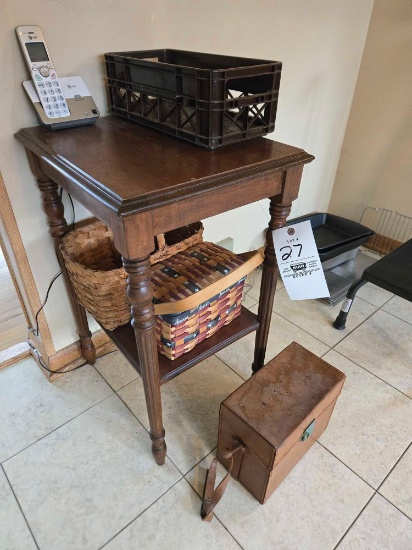 End stand, baskets, Polaroid camera