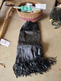 Leather skirt, yarn balls, basket