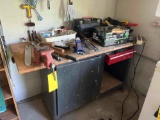 Work bench with a bench vice and contents