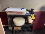 Plastic shelf with packing materials