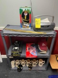 Plastic shelf with radio, hats, Steelers mugs
