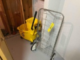 Shopping basket and a mop bucket