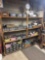 assorted hardware and power tools in basement shelf