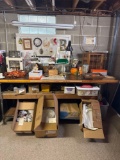 Contents on bench including china, glass, and miniatures