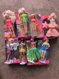 Group of Mattel Barbies with boxes, Olympic, Ken, Peach pretty and more