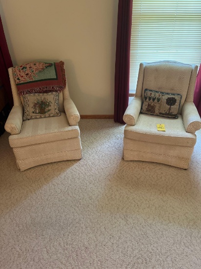 Pair of cushioned chairs