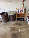 2 trash cans, small shelf, ortho home defense insect killer spray